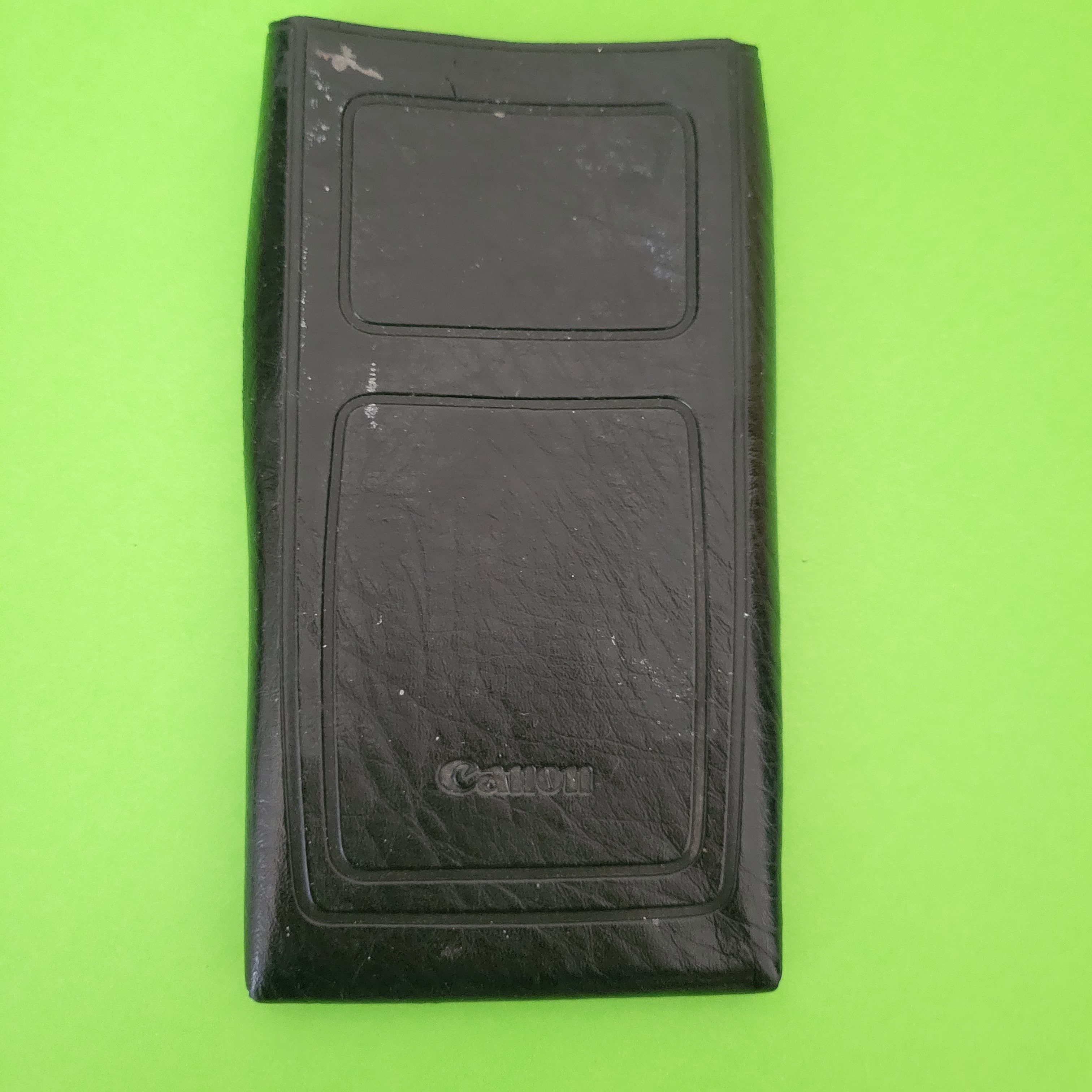 An image of the slip case of a canon card f-56 scientific/engineering calculator